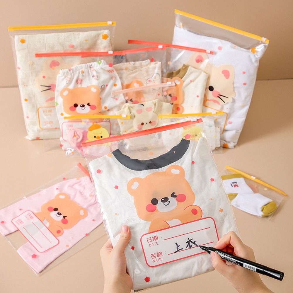 Diapering - 10個入り、様々なサイズに対応した収納バッグ。分類して収納できる、持ち運び可能なベビー服/おむつ用ポーチ。ベビー服の整理・収納に最適。密閉できるので、旅行にも便利。